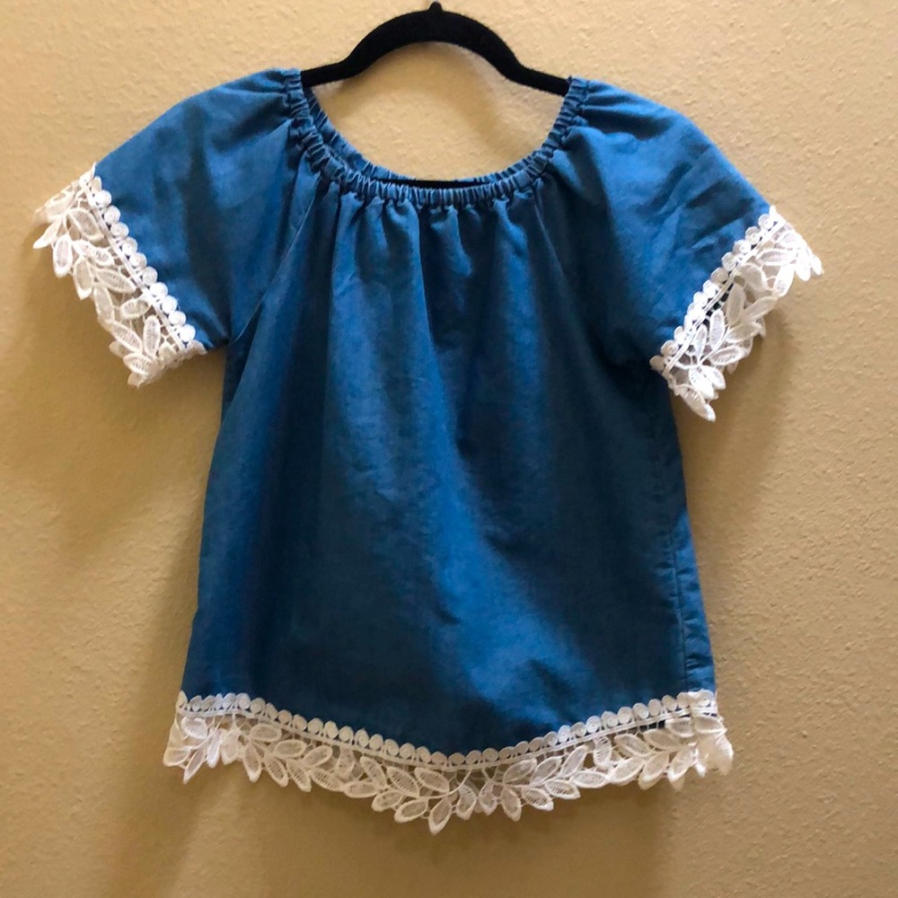 Girls size medium top with lace accents
